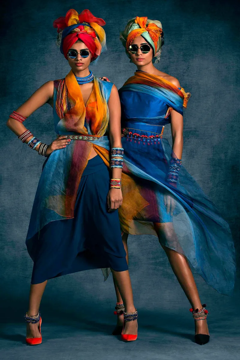 L-R Singh Twins Ombre gilet worn over a colour blocked bustier paired with a lungi skirt; Ombre draped shift dress Photographed by Rohit Chawla