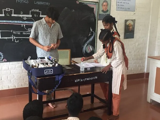 Manan with students